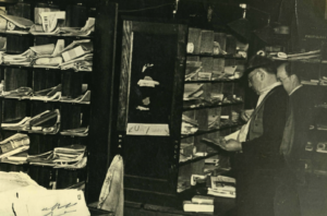 Two Post Office workers sorting mail in Greenwich