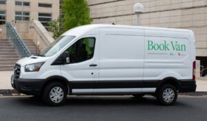 White van with book van logo on the side
