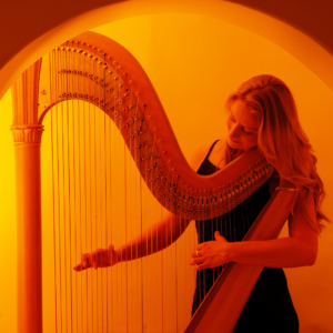 Women playing a harp